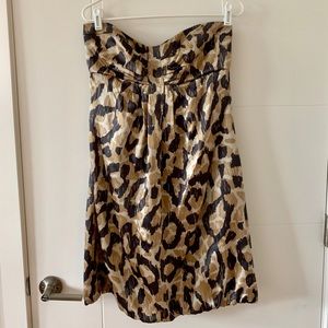 Strapless leopard cocktail dress.